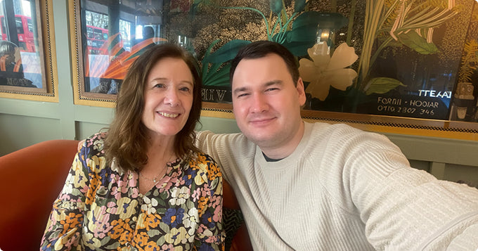 Dr. James Kilgour and his mother Gaynor smiling together indoors
