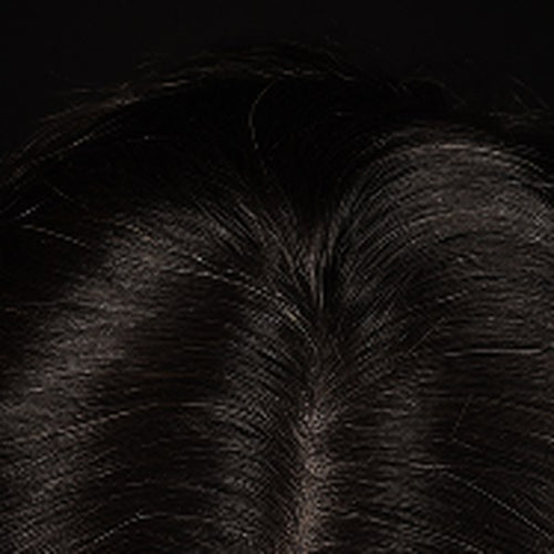 Sixth-week progress photo of dark hair parted at the crown