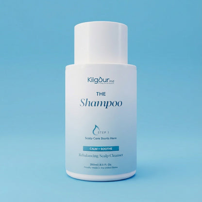 Front view of The Shampoo bottle (Calm + Soothe), 250 ml, showcasing KilgourMD branding and "Rebalancing Scalp Cleanser" label on blue background